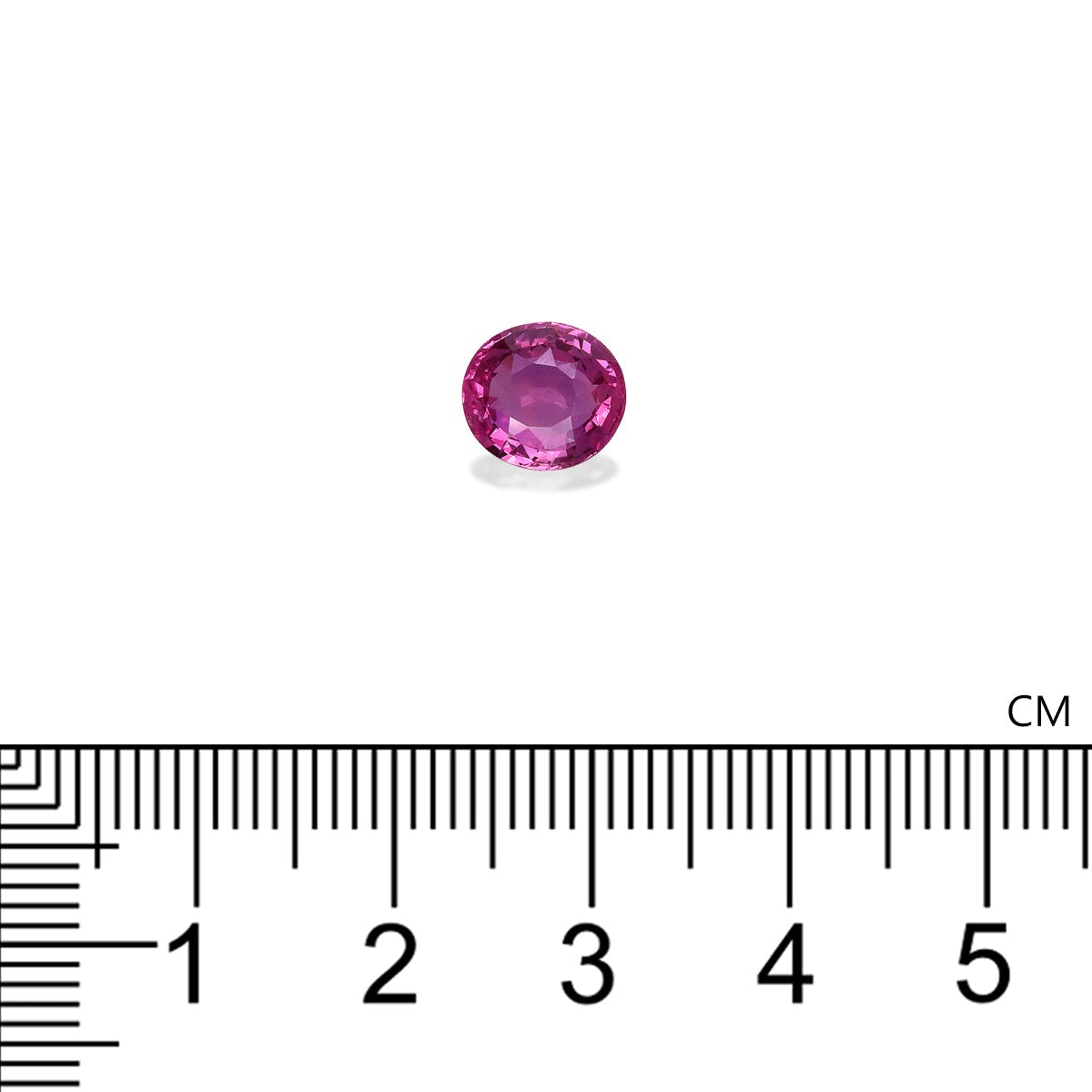 Le Saphir Rose · 2,03ct de Bonnot Paris est une petite pierre précieuse rose ronde présentée sur un fond blanc au-dessus d'une règle centimétrique, semblant mesurer environ 0,5 cm de diamètre.