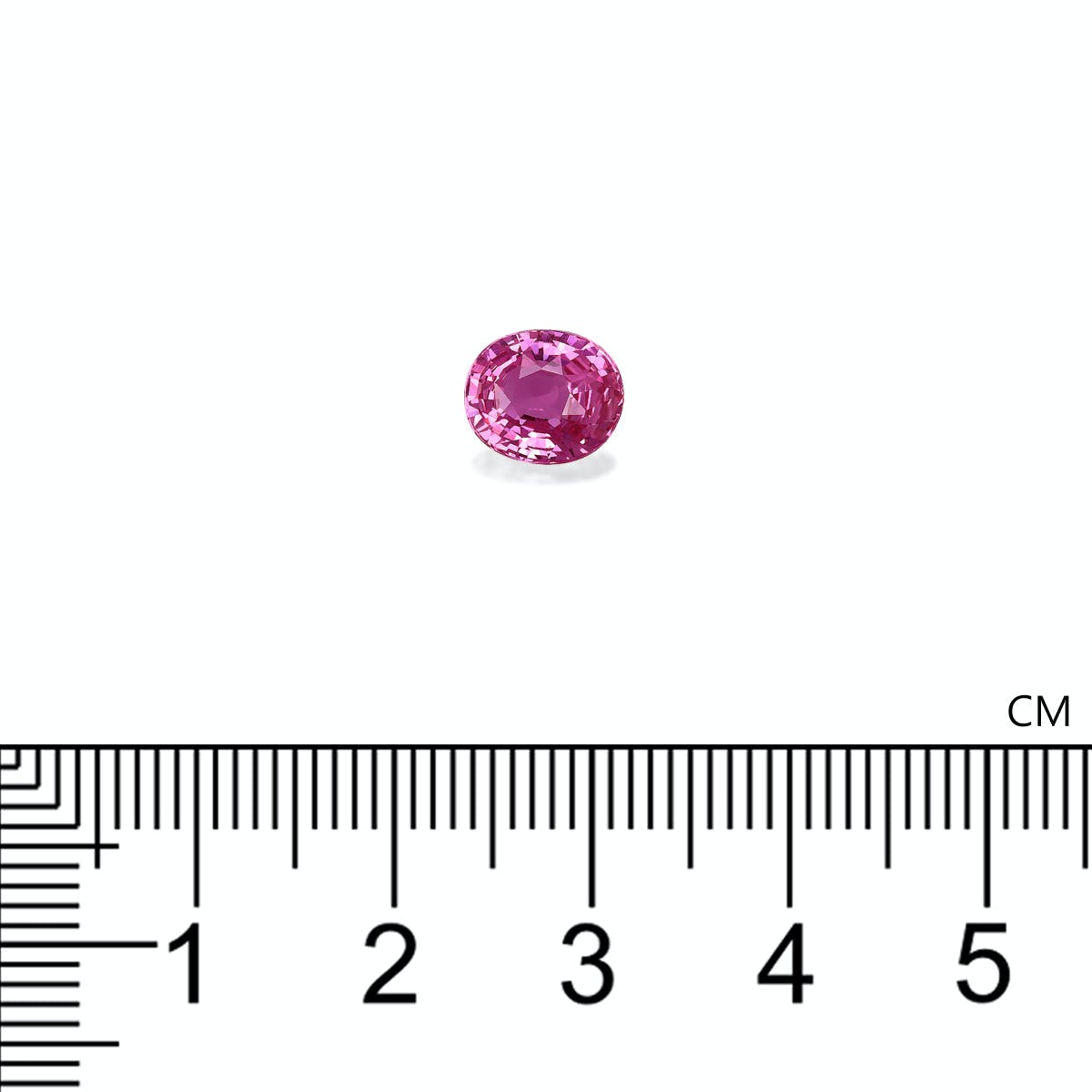 Une petite pierre précieuse rose ovale de Bonnot Paris, le Saphir Rose, pesant 2,08 carats, se détache sur un fond blanc. En dessous, une règle graduée mesure sa taille, soit environ 3 mm de long, idéale pour les créations de bijoux sur mesure.