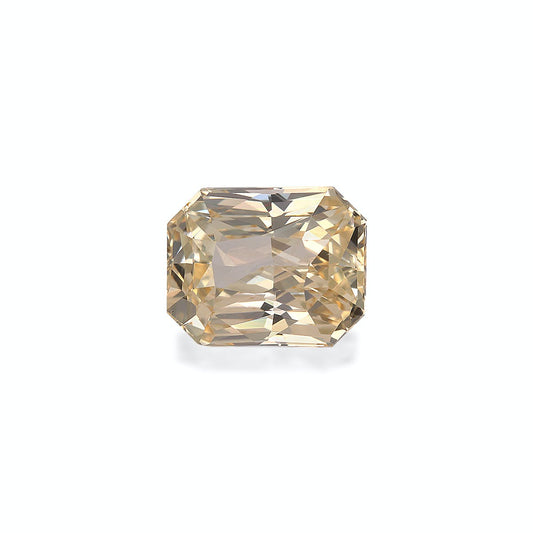 Un diamant Saphir Jaune rectangulaire facetté de 5,09 ct de Bonnot Paris est serti sur un fond gris clair uni, présentant des facettes bien définies qui scintillent et mettent en valeur différentes nuances de jaune et de marron.